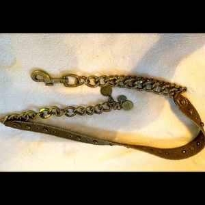 Kathy Van Zeeland belt.  Can go from 35-43”. Gold tone with bling